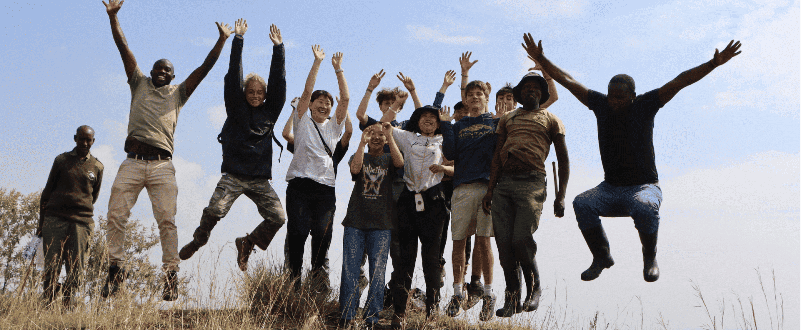 A group of volunteers jumping for joy in Kenya